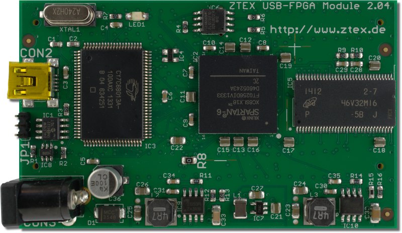 Top side of the ZTEX FPGA Board with Spartan 6 XC6SLX16 FPGA, DDR SDRAM and USB 2.0
