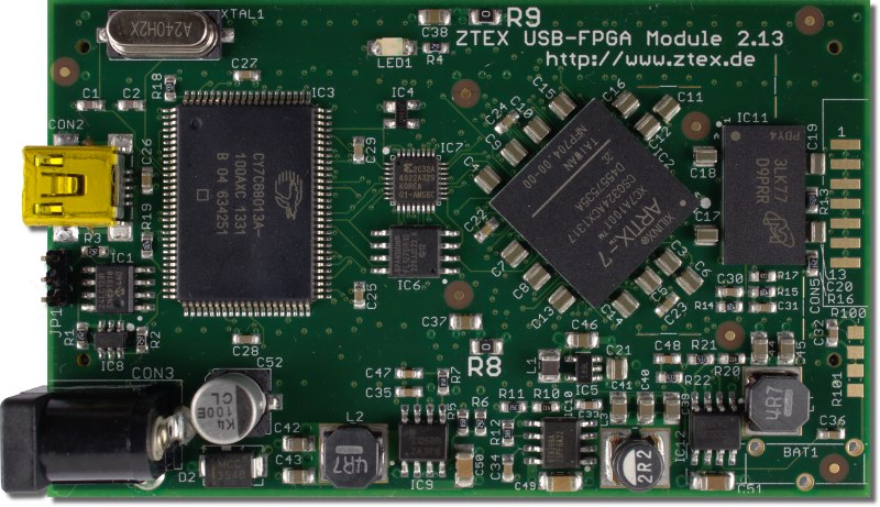 Top side of the ZTEX USB-FPGA Module 2.13d with Artix 7 XC7A100T FPGA, 256 MB DDR3 SDRAM and USB 2.0