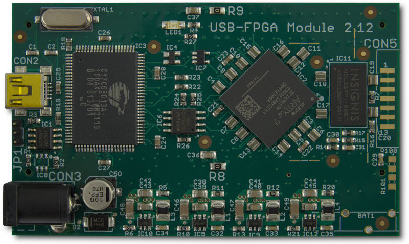 Top side of the ZTEX FPGA Board with Artix 7 XC7A35T, DDR3 SDRAM and USB 2.0